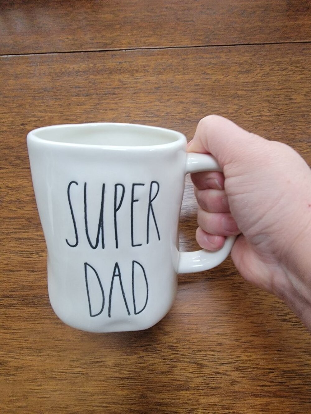 Rae Dunn ceramic mug by Magenta, "Super Dad" in black lettering on white glaze